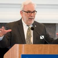 speaker presents awards